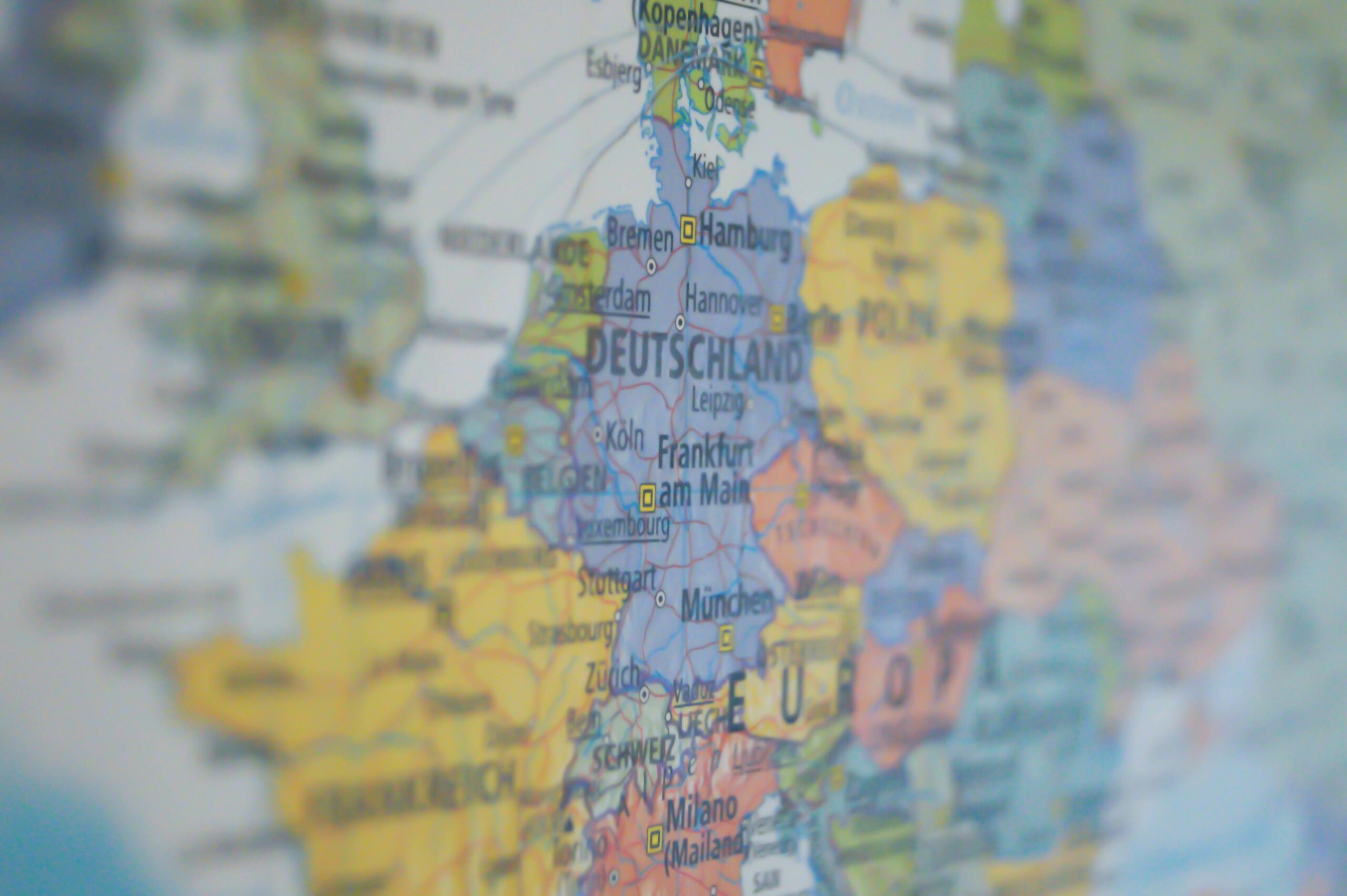 pexels-photo-269790-269790 Close-up view of Germany on a colorful world map showing major cities.